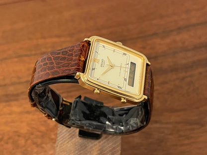 (1985) Seiko H601-5010 Alarm Chronograph - cream dial w/ gold Roman numerals (mint)