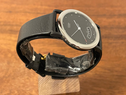 (1989) Citizen QD9022-05E dress watch - black lugs - black dial w/ arc date window (NOS)