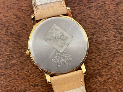 (1989) Seiko 5Y94-8000 dress watch - gold case - cream dial w/ black Roman numerals (NOS)