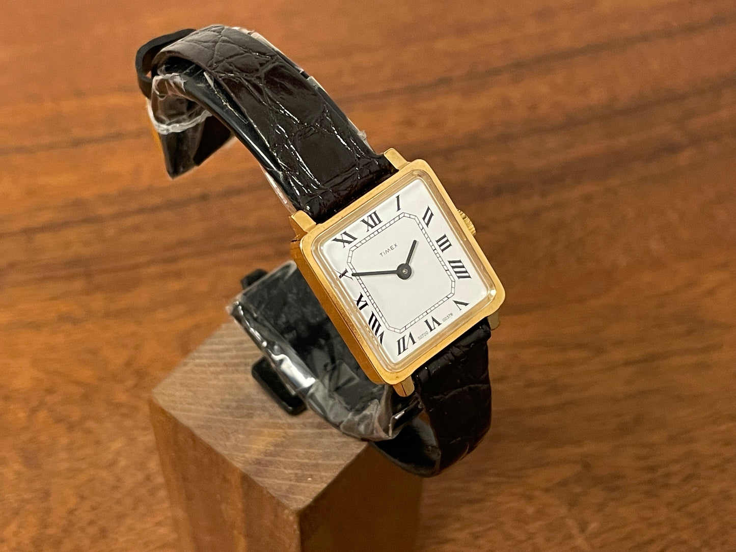 (1970s) Timex 527-201 "Tank" dress watch - gold case - white dial w/ Roman numerals - small size (NOS + Full set)