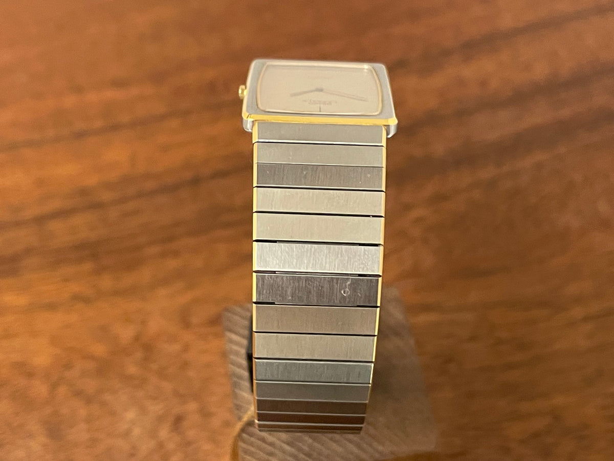 (1983) Seiko 6730-565H Lassale ultra thin - stainless steel bracelet - brushed gold dial w/ black stick markers (NOS)