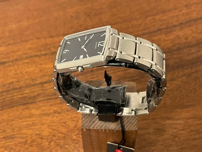 (1990) Citizen 1015-H23389 - integrated bracelet - black dial w/ silver Arabic numerals & markers (NOS)