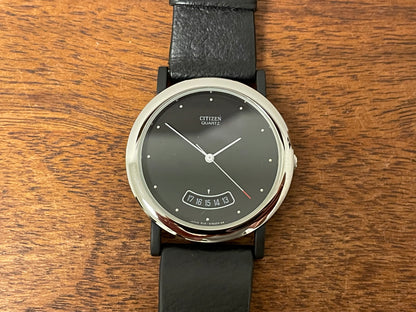 (1989) Citizen QD9022-05E dress watch - black lugs - black dial w/ arc date window (NOS)