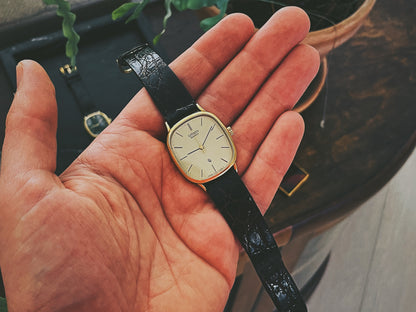 Citizen 18K Golden Ellipse homage watch in hand