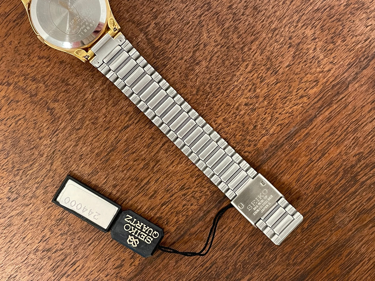 (1983) Seiko 8420-0140 dress watch - gold case - gold sunburst dial w/ gold stick markers (NOS)