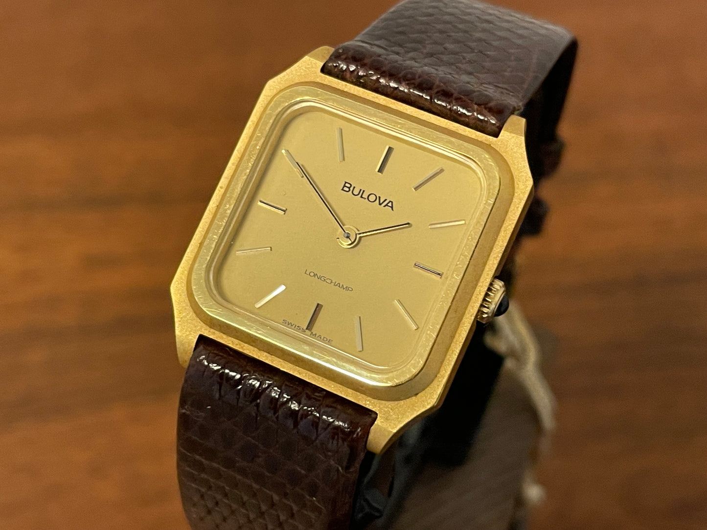 (1982) Bulova Longchamp "Tank" dress watch - gold case w/ champagne dial - small size (NOS)