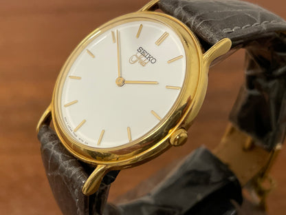 (1994) Seiko 7N00-S007 "Gold" 18K gold collection dress watch - 18k solid gold case - white dial w/ gold markers