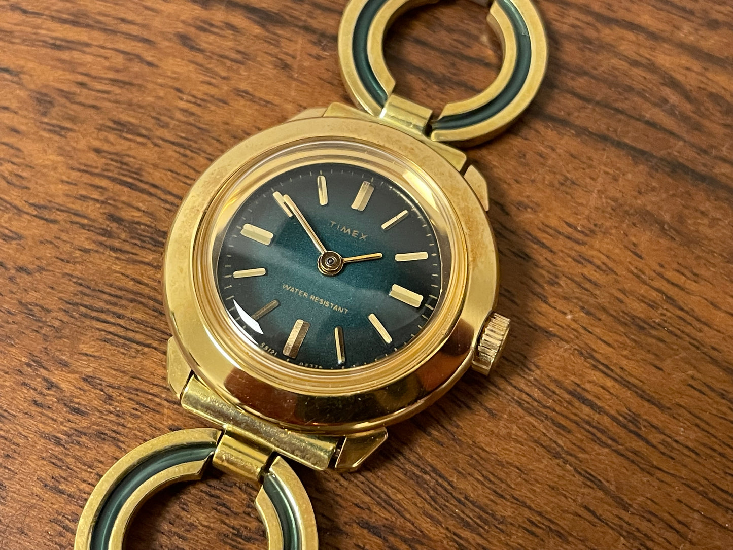 (1970s) Timex 551-211 dress watch - gold case - green dial w/ gold markers - small size (NOS + full set)
