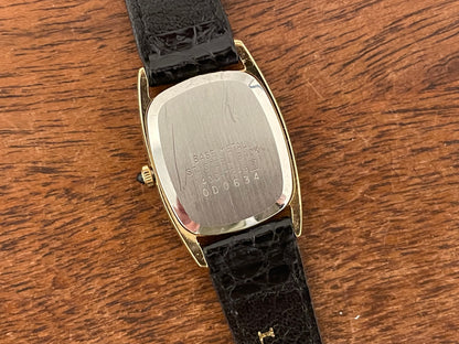 (1980) Seiko 1400-7249 Lassale "Ellipse" dress watch - black dial w/ gold Roman numerals - small size (NOS)