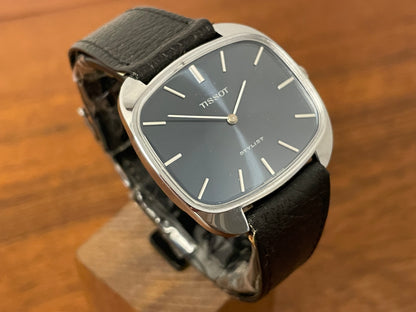 (1970s) Tissot 41436 Stylist dress watch - silver “tv case” - sunburst blue dial w/ silver stick markers (NOS)