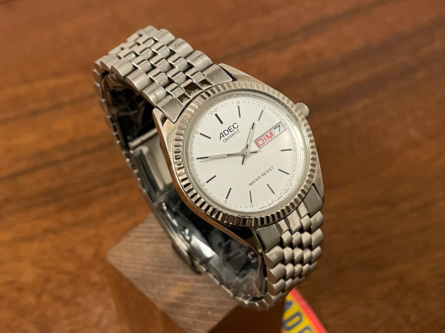 (1980) ADEC (by Citizen) "Day-Date" - fluted bezel - silver dial w/ stick markers - small size (NOS)