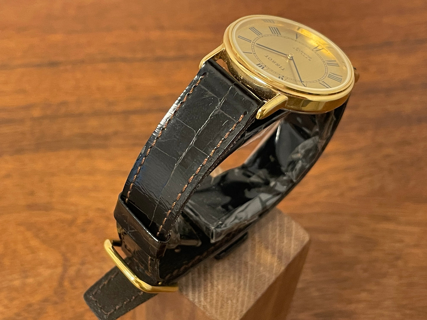 (1970s) Tissot 40771 Stylist dress watch - gold case - brushed gold dial w/ black Roman numerals (NOS)