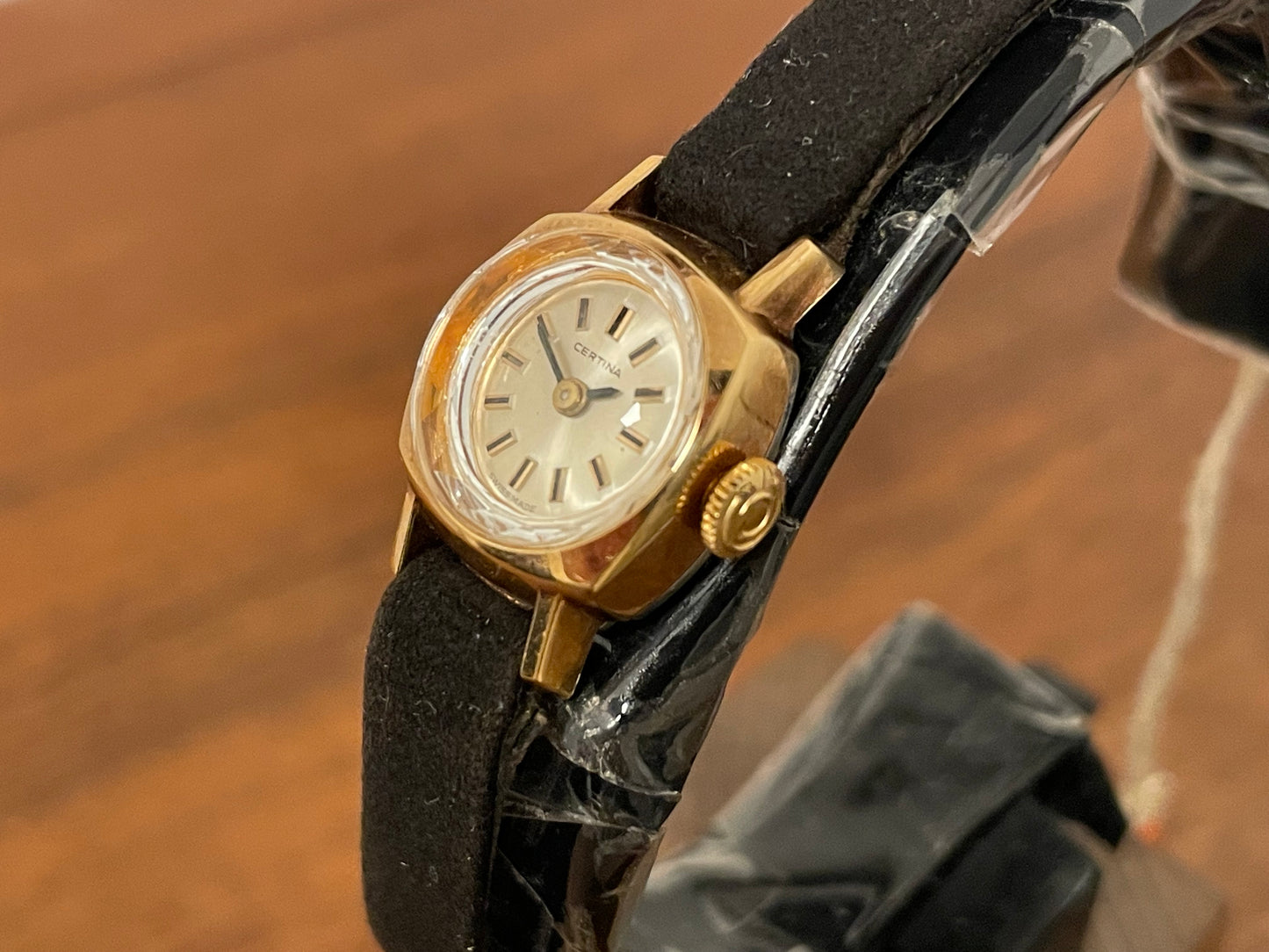 (1970s) Certina 2850 "cocktail" dress watch - silver sunburst dial w/ stick markers - small size (NOS)