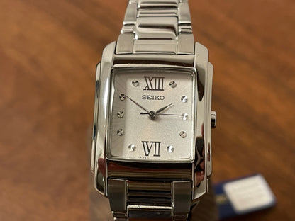 (1999) Seiko 7N01-0FW0  - "Tank" style case - silver dial w/ silver Roman numerals - small size (NOS)