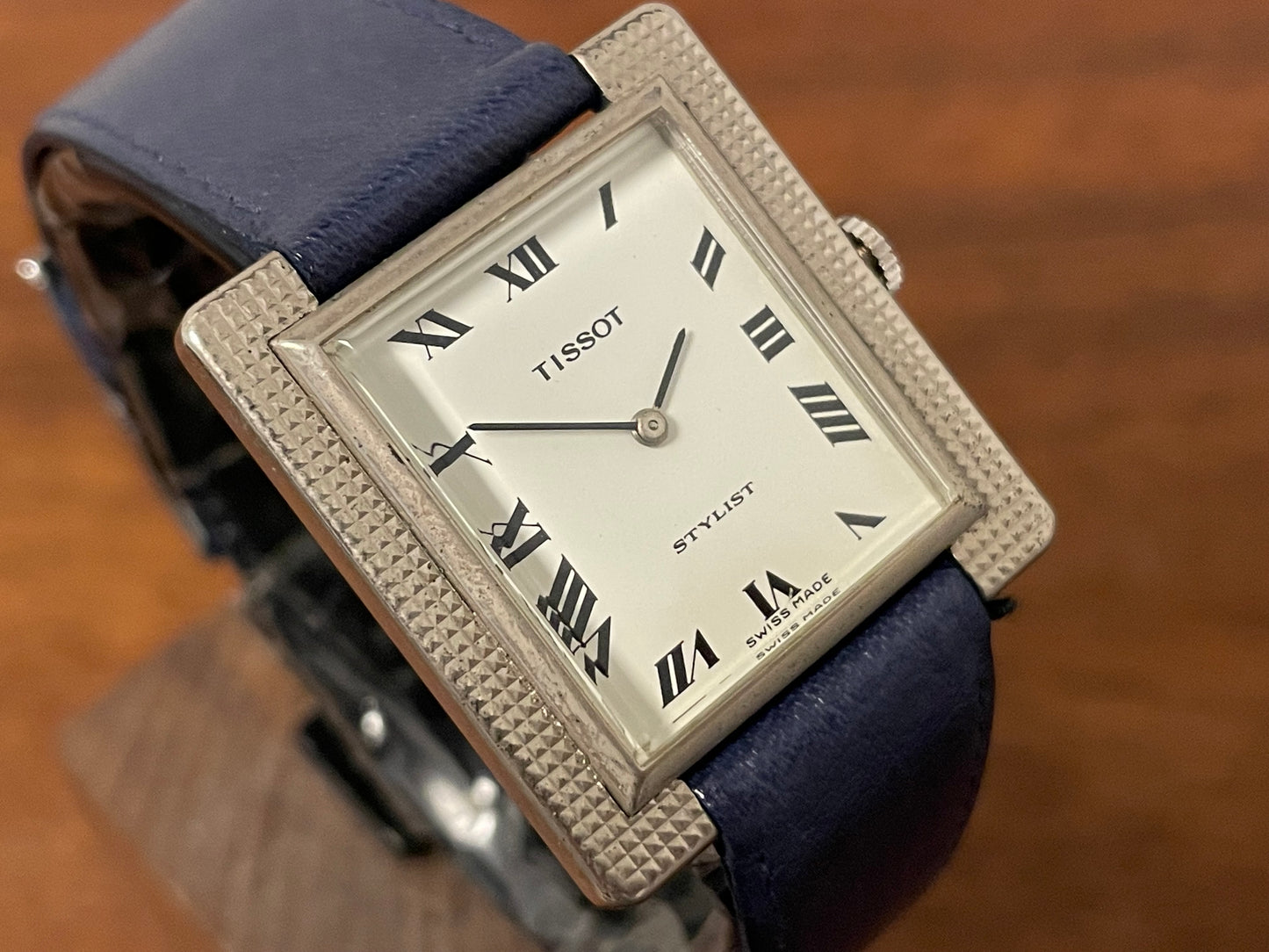 (1970s) Tissot Stylist "Tank" - decorated case - white dial w/ black Roman numerals (NOS)