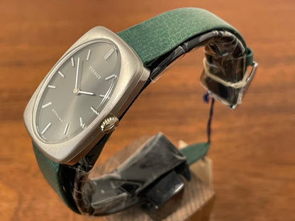 (1970s) Tissot Stylist dress watch - oval grey sunburst dial w/ white stick markers - small size (NOS)