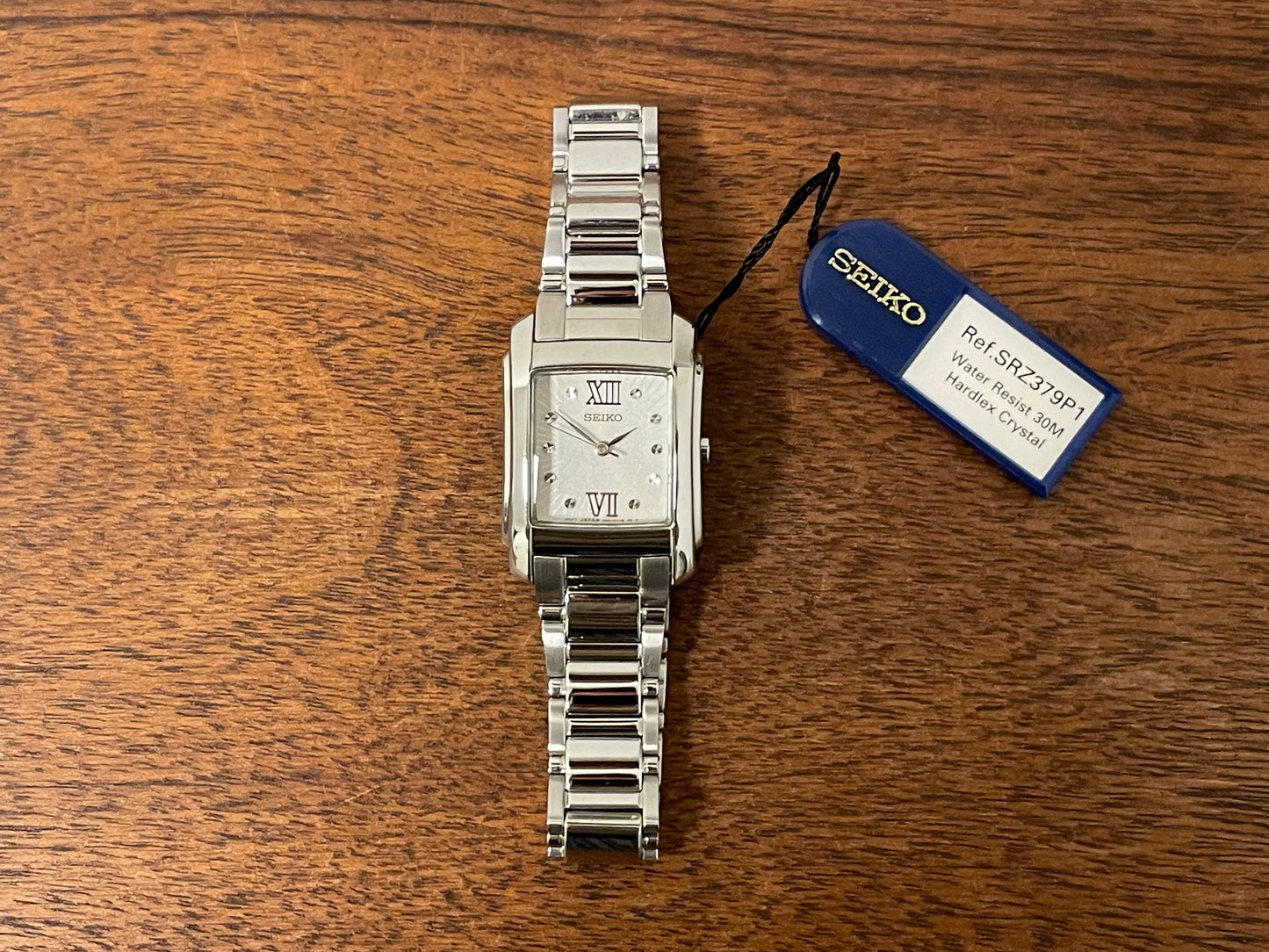 (1999) Seiko 7N01-0FW0  - "Tank" style case - silver dial w/ silver Roman numerals - small size (NOS)