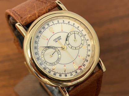 (1988) Citizen 6355-Y55299 triple calendar - cream dial w/ gold Arabic numerals (mint)