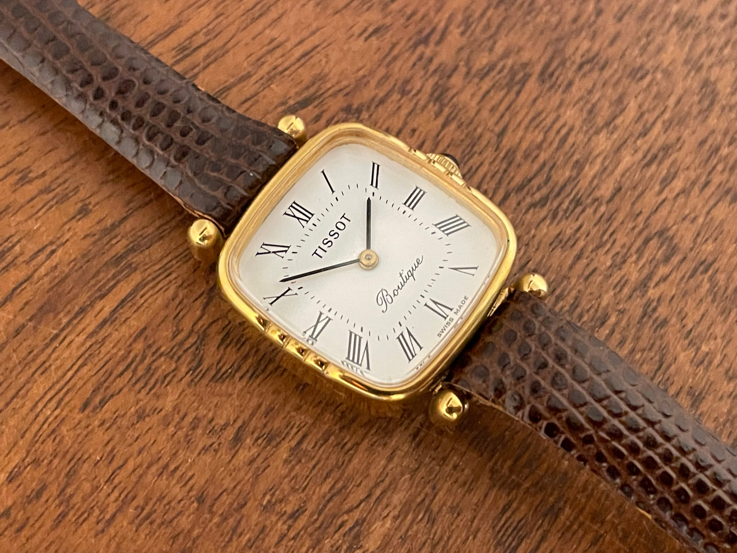 (1970s) Tissot Boutique dress watch - white dial w/ black Roman numerals - small size (NOS)