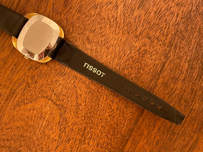 (1970s) Tissot Stylist dress watch - gold “tv case” - white dial w/ black Roman numerals (NOS)