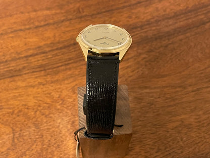 (1991) Pulsar Y480-0460 dress watch - gold colored case - matt champagne dial w/ black Arabic numerals - (NOS)