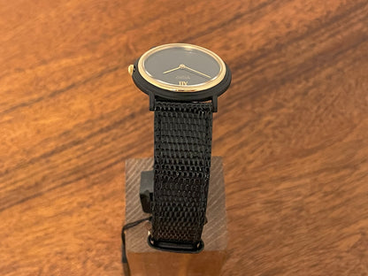 (1993) Seiko 6530-5120 dress watch- oval black case w/ gold bezel en hands (NOS)