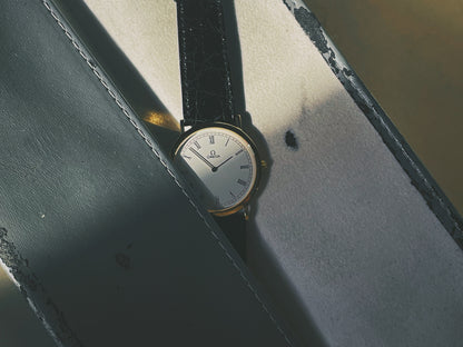 (1990s) Omega De Ville 195.0075 ultra thin dress watch - Cal. 1378 - cream dial w/ Roman numerals (NOS) in sleeve