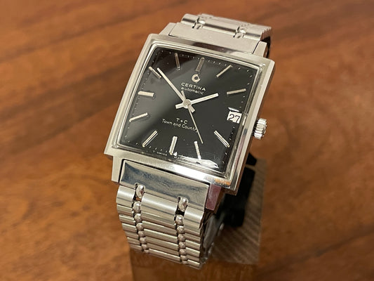 Front side (1960s) Certina 5301.115 Town & Country - bracelet - square case - black dial w/ silver markers (NOS)