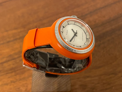 (1970s) Timex 290-181 UFO - orange plastic case - white dial w/ silver markers - small size (NOS + full set)