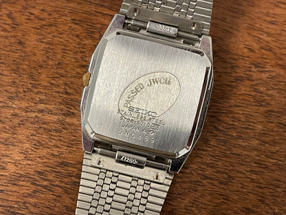 (1985) 5Y02-5010 Seiko 5 quartz - integrated bracelet - silver brushed dial w/ stick markers (mint)