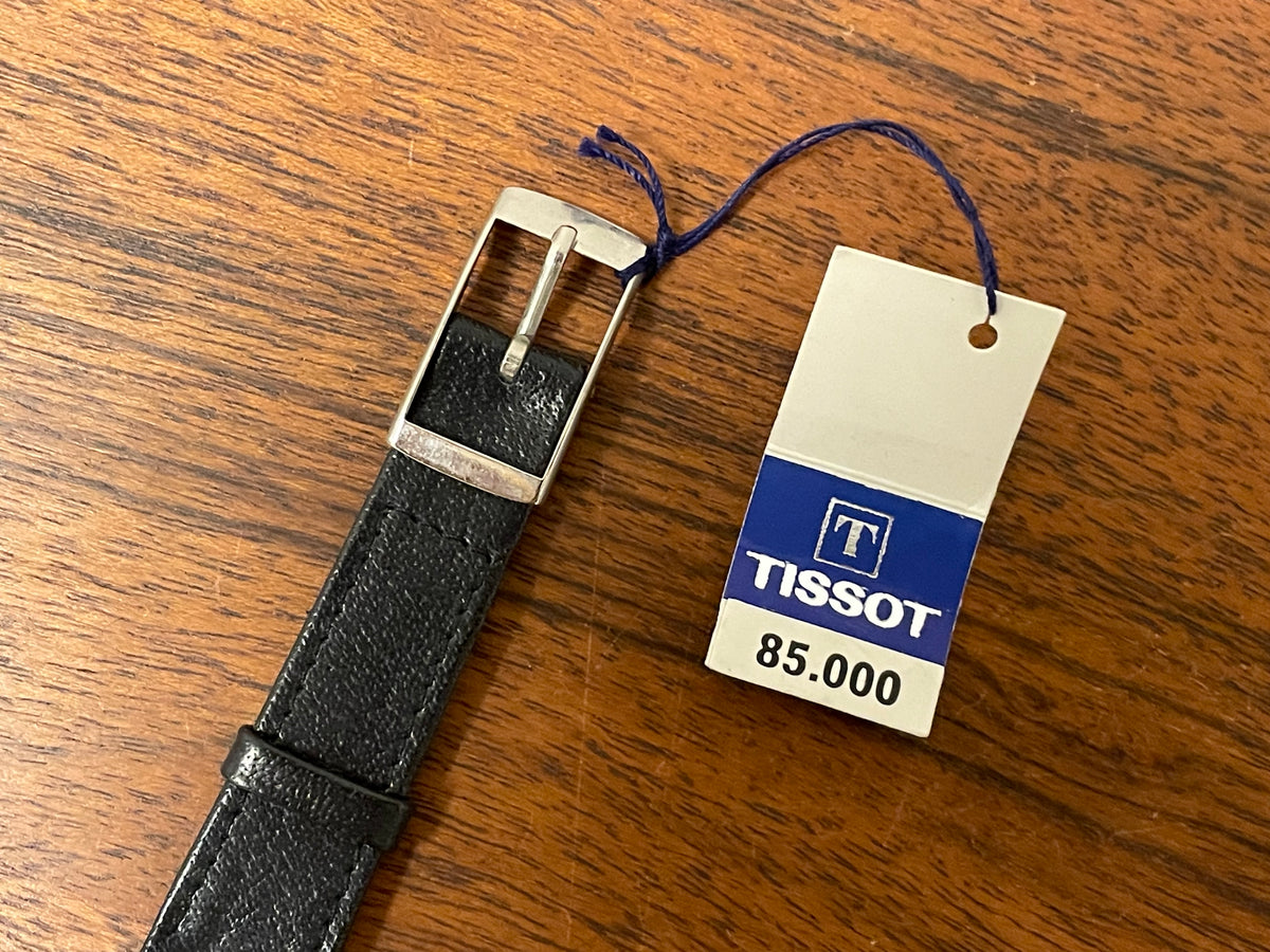 (1970s) Tissot 052-15007 Stylist dress watch - silver cushion case - silver brushed dial w/ silver stick markers - small size (NOS)