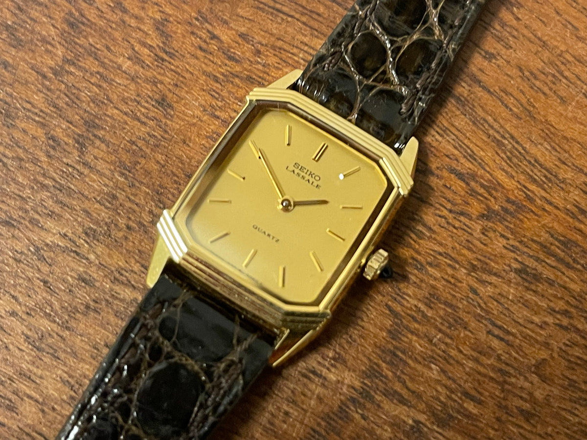 (1982) Seiko 1230-502H Lassale "Tank" dress watch - gold case - gold dial w/ gold stick markers - small size (NOS)