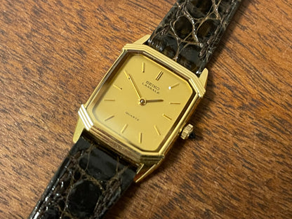 (1982) Seiko 1230-502H Lassale "Tank" dress watch - gold case - gold dial w/ gold stick markers - small size (NOS)