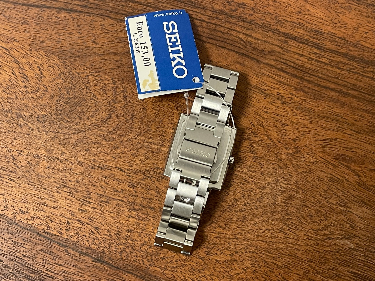 (2002) Seiko 7N32-5A30 - integrated bracelet - black dial w/ white Arabic numerals & markers (NOS)