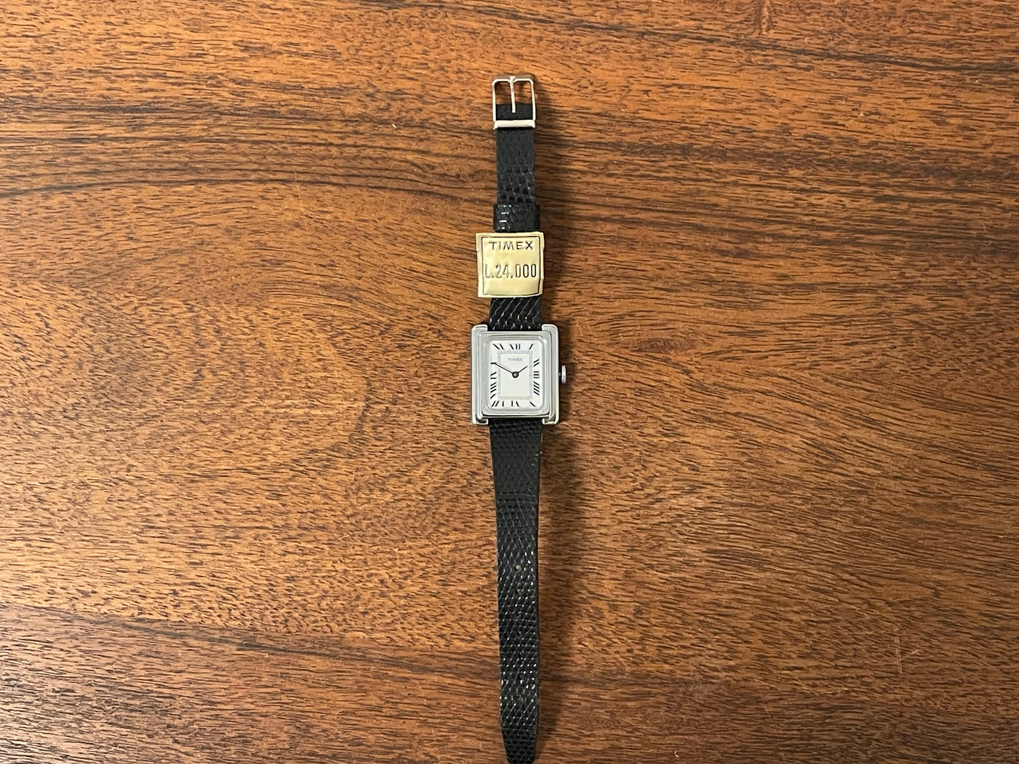 (1970s) Timex "Tank" dress watch - silver case - white dial w/ Roman numerals - small size (NOS)