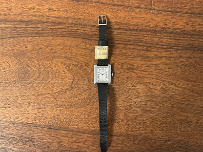(1970s) Timex "Tank" dress watch - silver case - white dial w/ Roman numerals - small size (NOS)