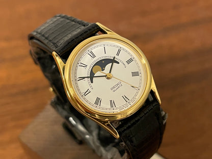 (1986) Seiko 2A24-0040 dress watch - white dial w/ moonphase & Roman numerals - small size (NOS)