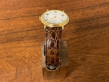 (2000) Pulsar V532-8A60 dress watch - gold colored case - white dial w/ black Roman numerals (NOS)