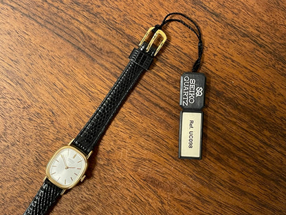 (1981) Seiko 5420-5119 "Ellipse" - gold plated case - silver sunburst dial w/ gold markers - small size (NOS)