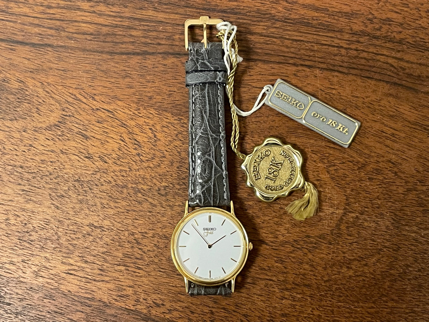 (1994) Seiko 7N00-S007 "Gold" 18K gold collection dress watch - 18k solid gold case - white dial w/ gold markers