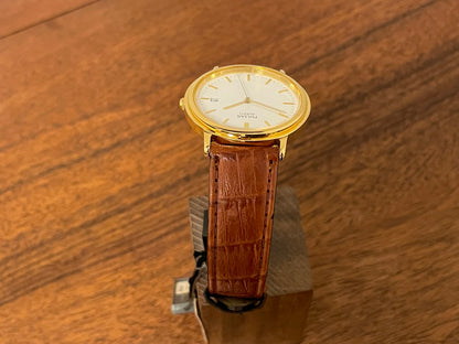 (2003) Pulsar V532-8B40 dress watch - gold colored case - white dial w/ gold markers (NOS)