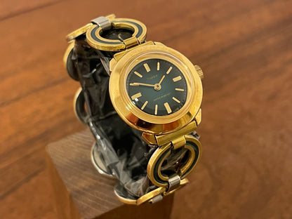 (1970s) Timex 551-211 dress watch - gold case - green dial w/ gold markers - small size (NOS + full set)