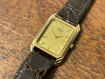 (1983) Seiko 7320-5500 "Tank" dress watch - gold dial w/ gold markers - small size (NOS)
