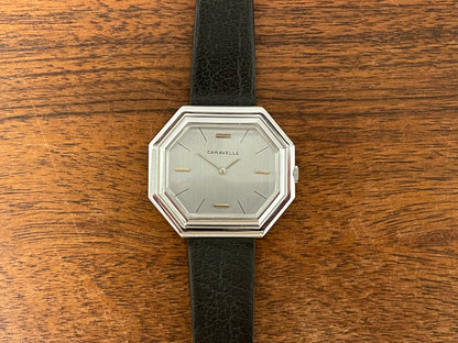 (1974) Caravelle dress watch - octagon case - brushed silver dial w/ stick markers (mint)