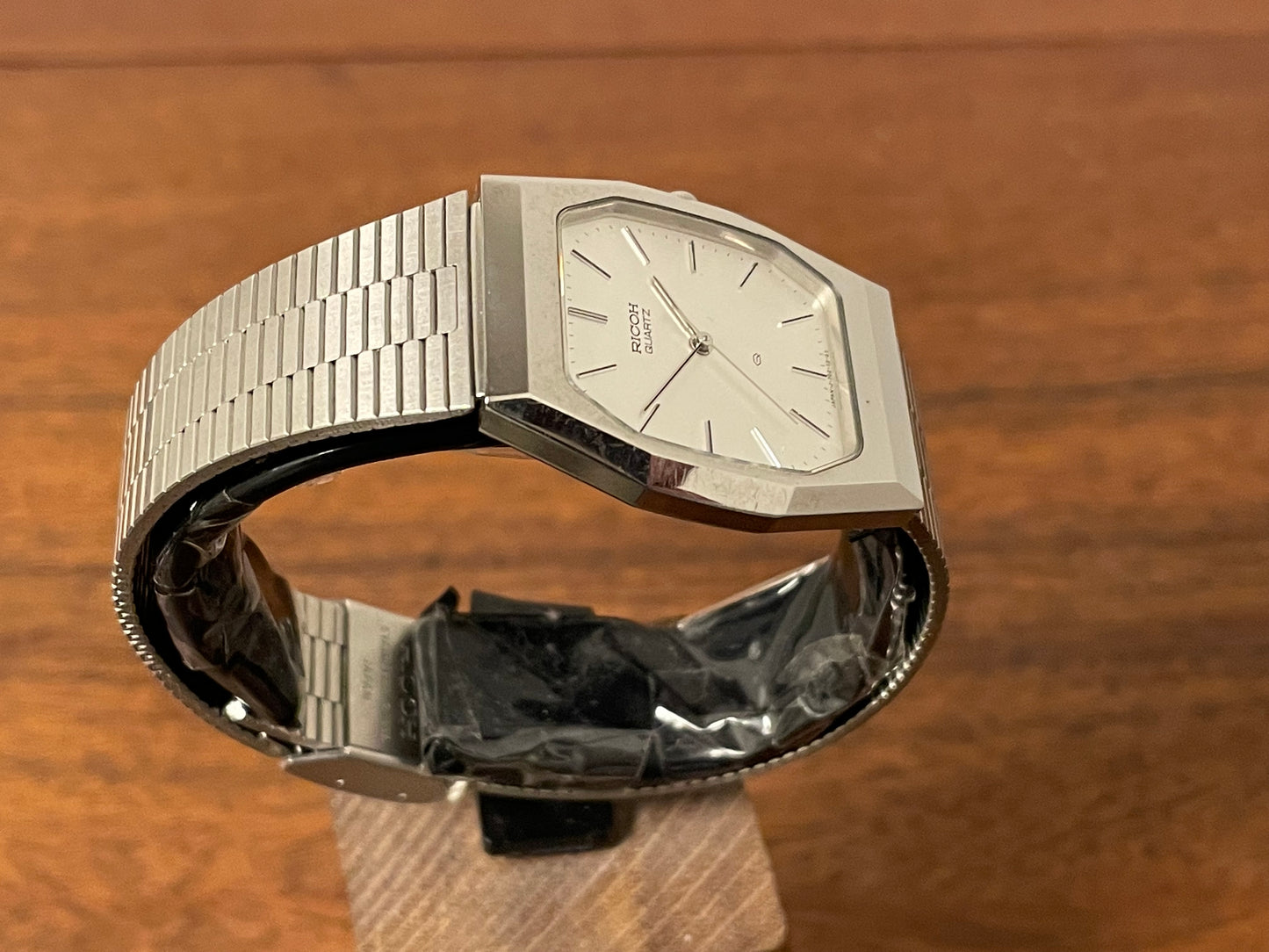 (1977) Ricoh 702008SS dress watch - silver brushed dial w/ silver markers (NOS)