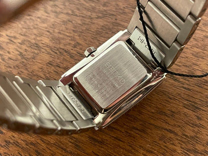 (1995) Seiko 1N00-OJH0 - "Tank" style case - blue dial w/ silver Roman numerals & markers - small size (NOS)