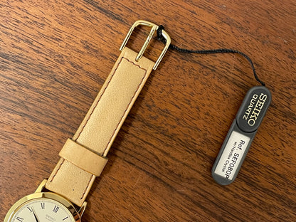 (1989) Seiko 5Y94-8000 dress watch - gold case - cream dial w/ black Roman numerals (NOS)