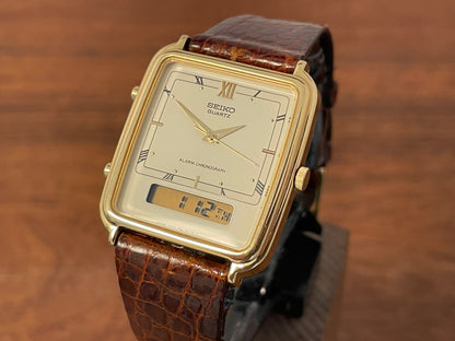 (1985) Seiko H601-5010 Alarm Chronograph - cream dial w/ gold Roman numerals (mint)