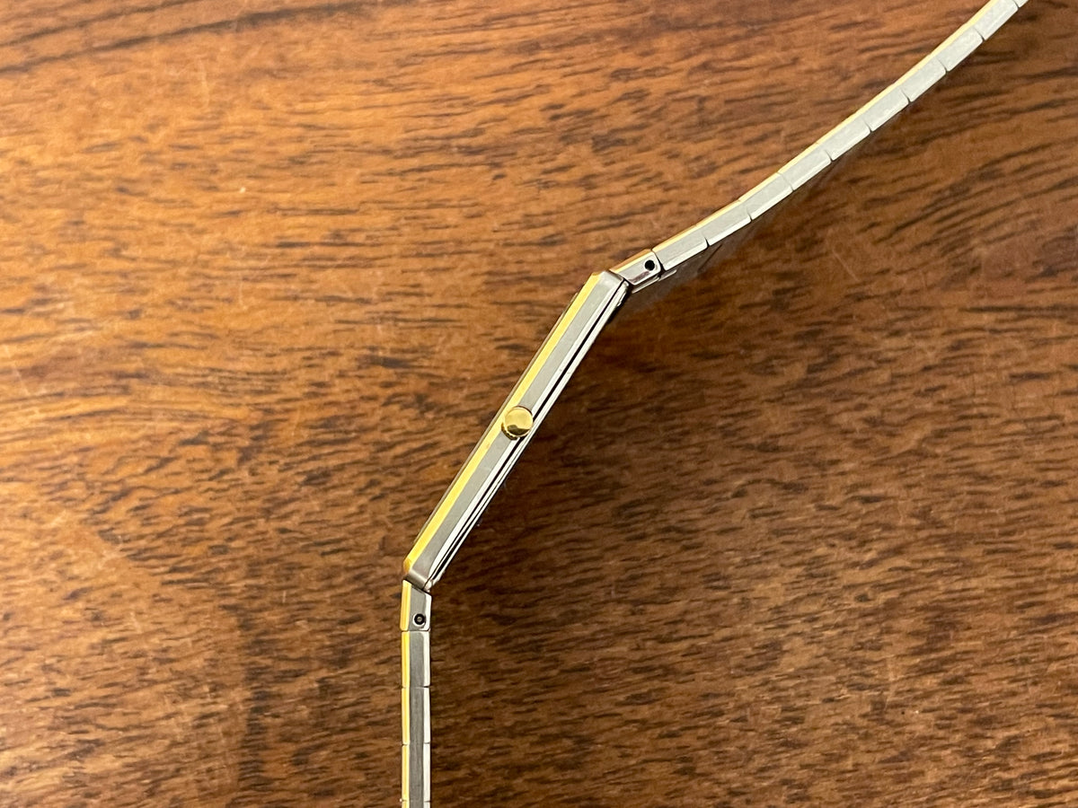 (1983) Seiko 6730-565H Lassale ultra thin - stainless steel bracelet - brushed gold dial w/ black stick markers (NOS)