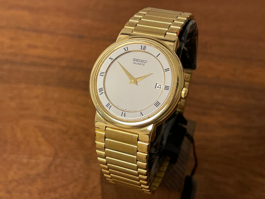 (1992) Seiko 5Y89-7A10 dress watch – white dial w/ Roman numerals & date (NOS)